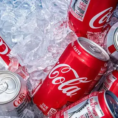 Cans of cola on ice