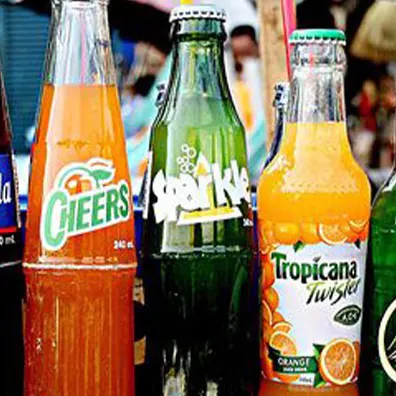 Carbonated soft drinks in glass bottles