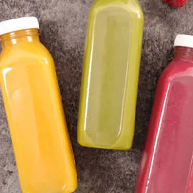 Bottled fruit juices and tea drinks with fresh fruit