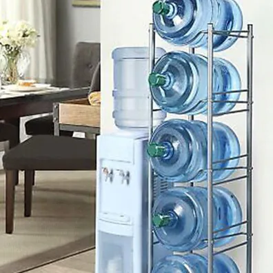 5 gallon water barrels on a rack next to a water dispenser