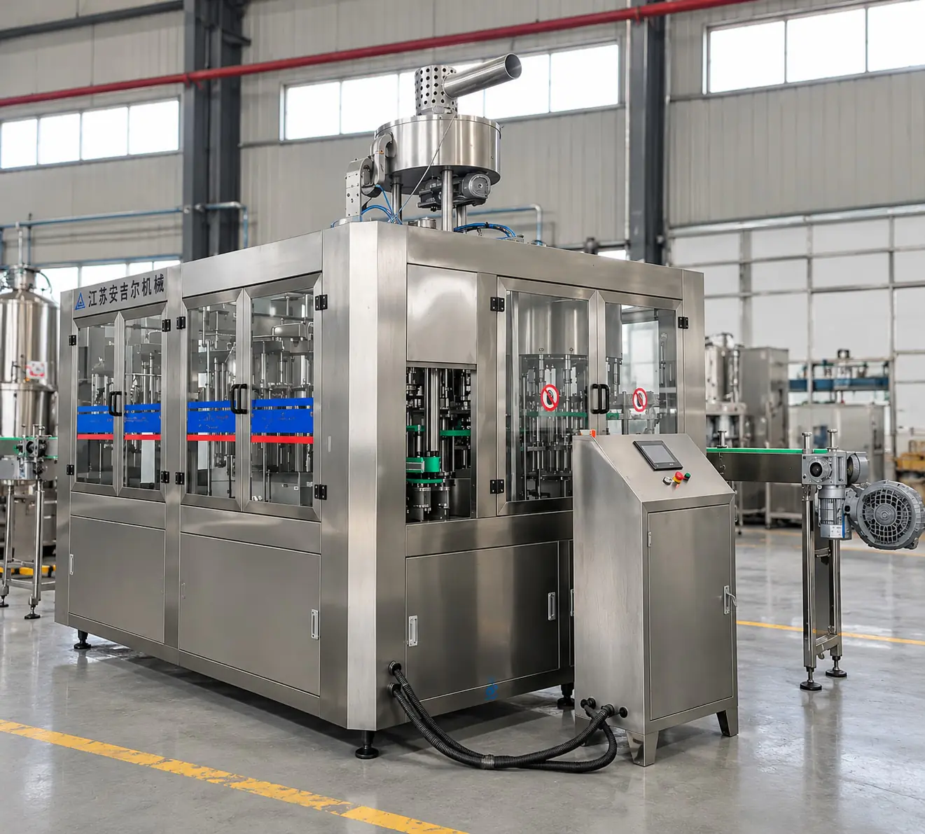 Juice and tea filling machine in the Angel workshop