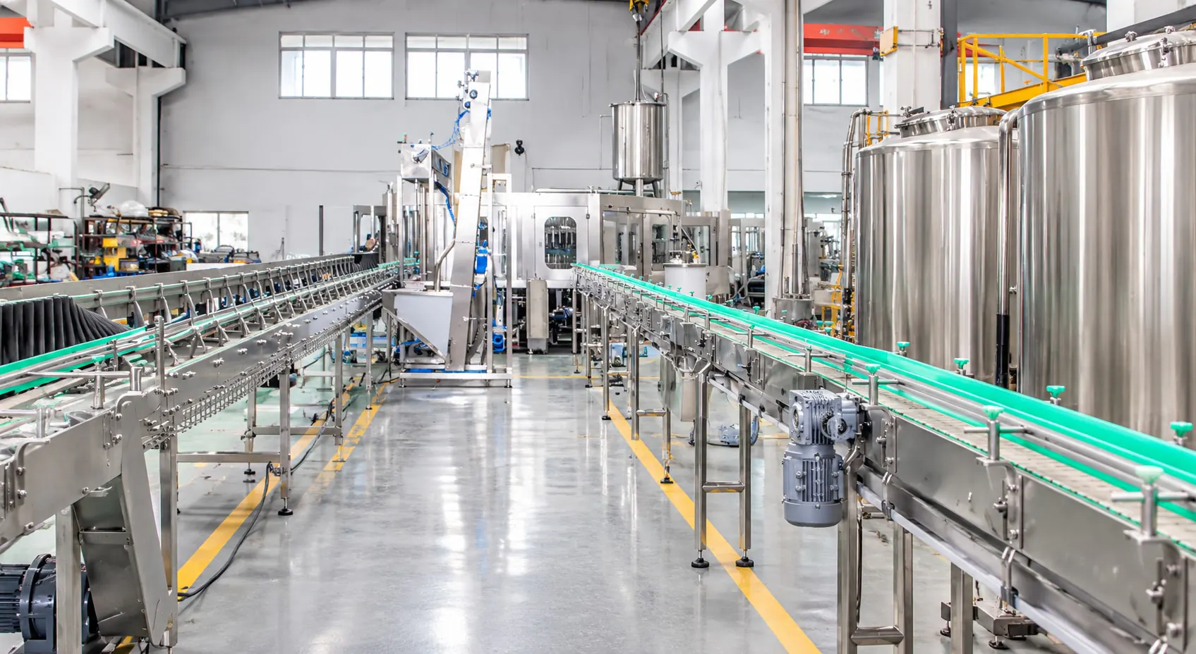 Juice filling line conveyors and tanks in the Angel workshop