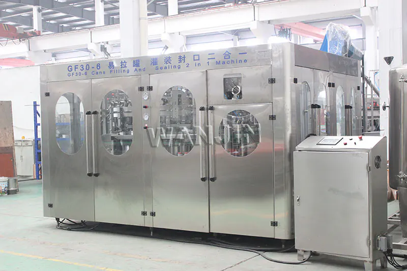 Beverage can filling and seaming machine
